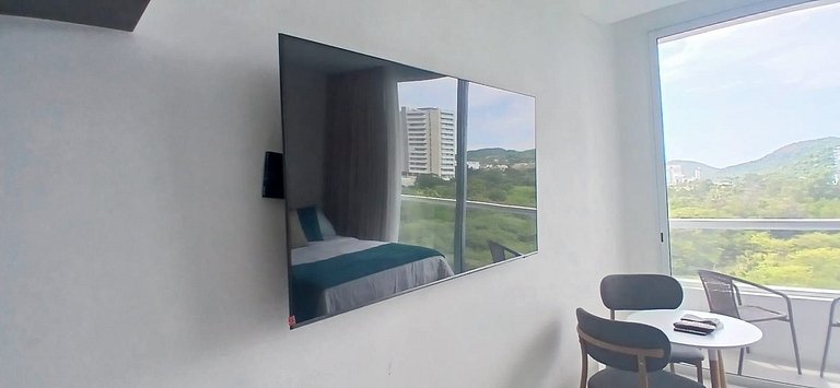 Apartamento con Vista al Mar y Montañas